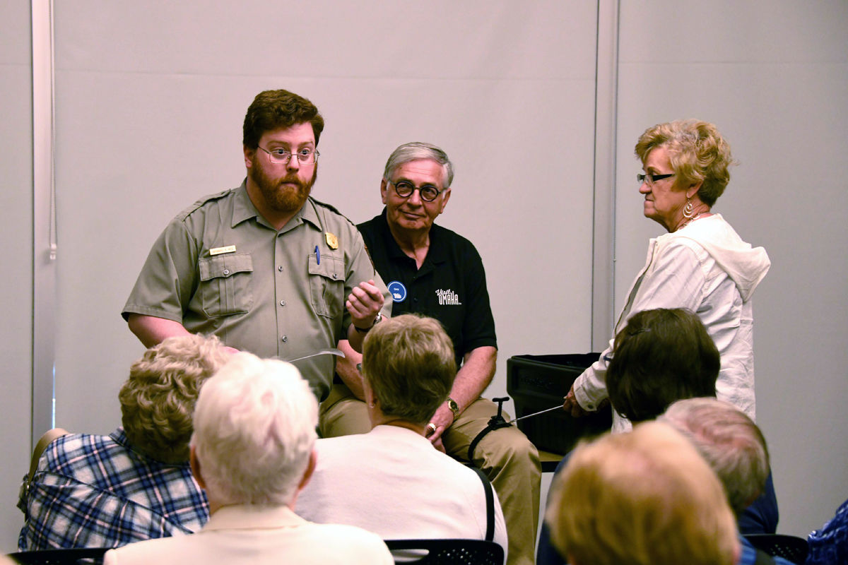 009 The park ranger told the Fun Club about medicine in pioneer times. Omaha guide Gary and Fun Club traveler Pat Bredenkamp assisted..JPG